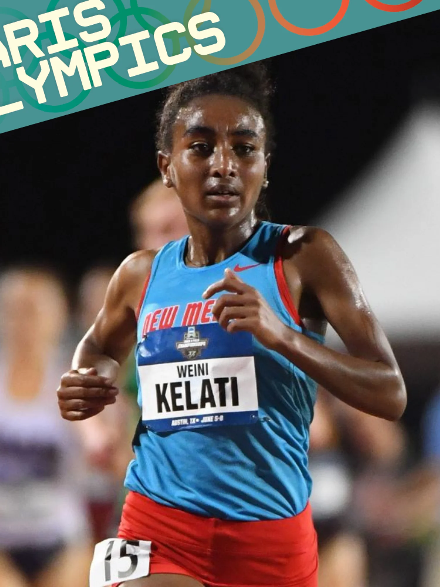A photo of Weini Kelati running.