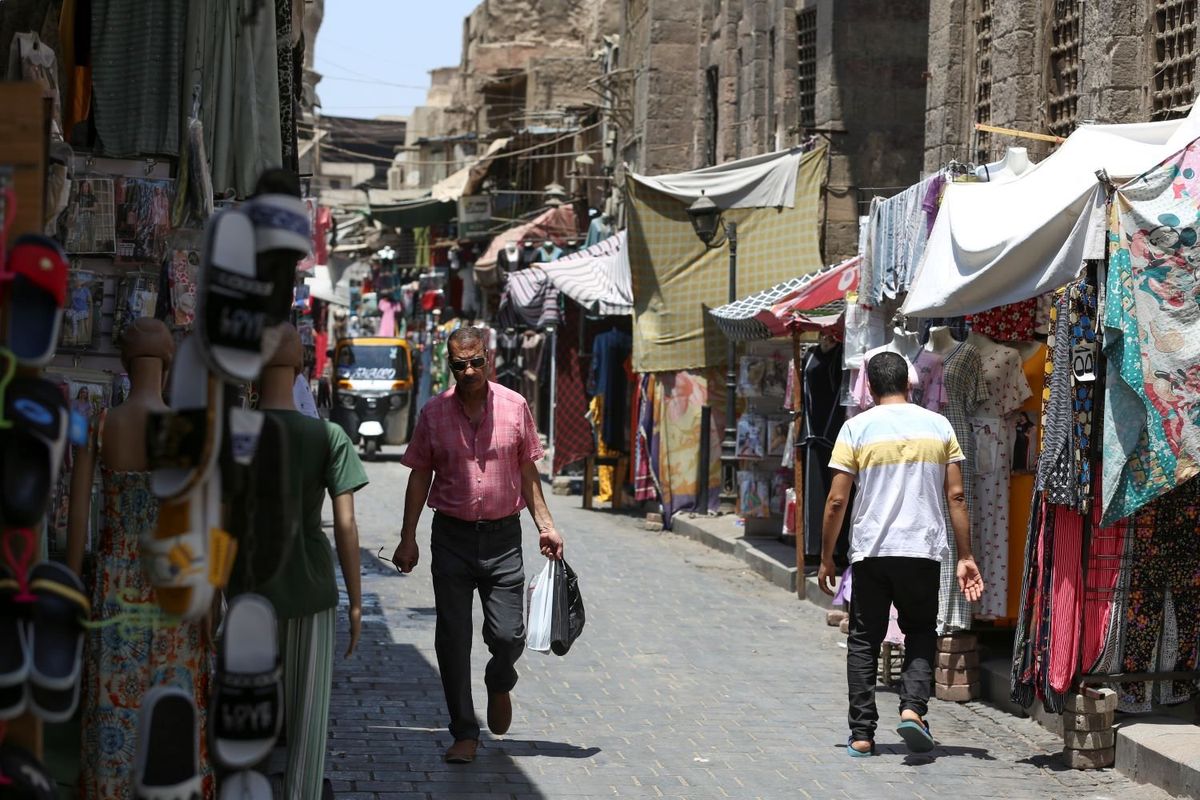 A photo of Al-Moez street in Al-Gamaleya neighborhood next to the Khan Al-Khalili market area in Cairo, Egypt.