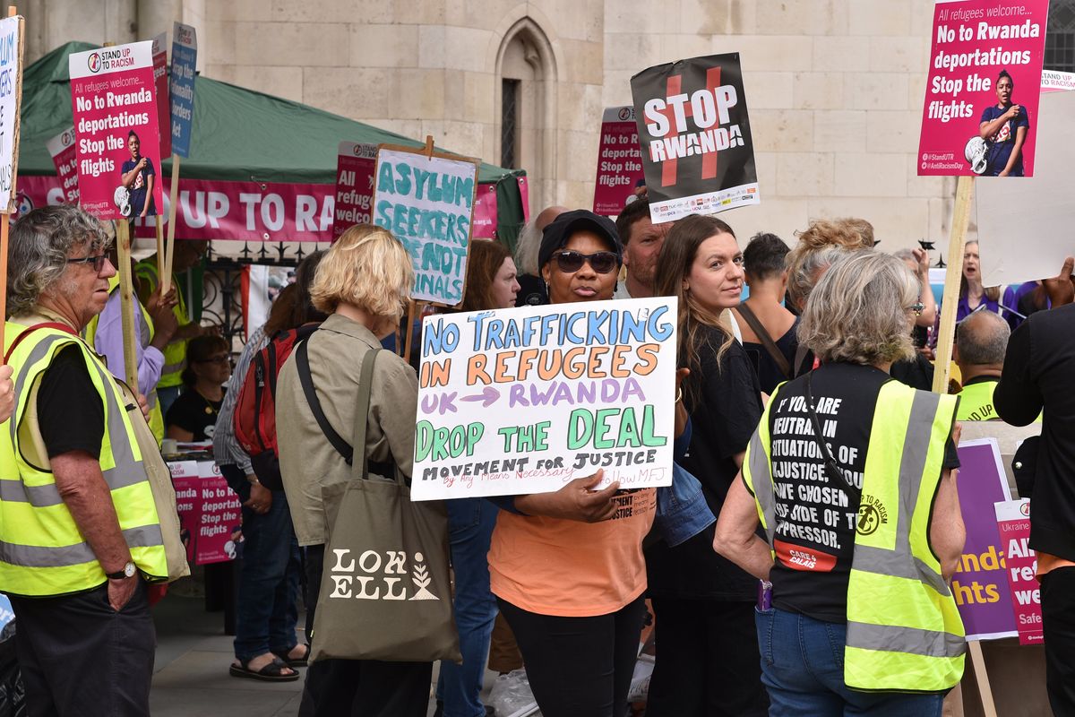 A photo of protesters demonstrating against the UK-Rwanda asylum deal arrangement in September, 2022.