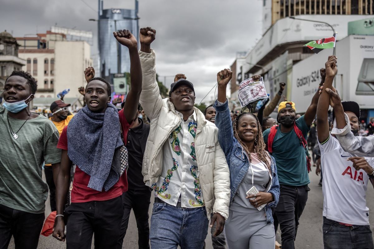 A photo of protesters marching while chanting anti-government slogans during a demonstration against tax hikes in downtown Nairobi, on June 20, 2024.