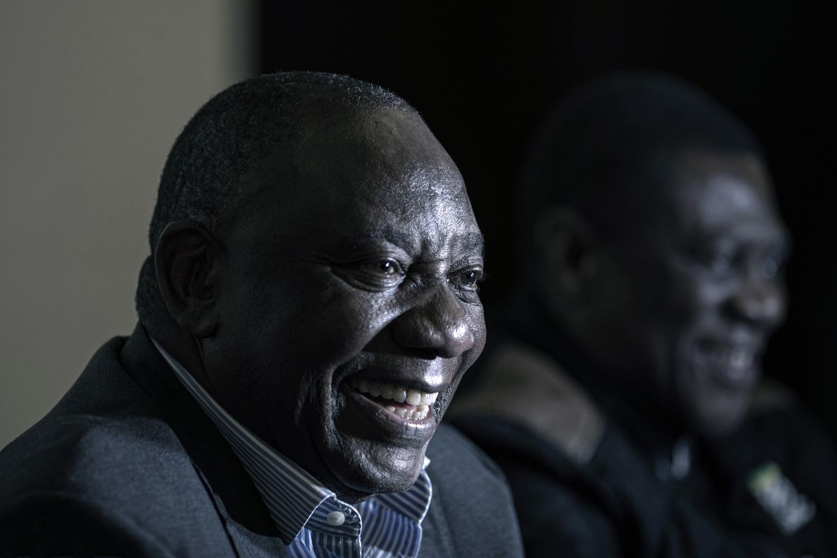 A photo of South African President, Cyril Ramaphosa smiling.