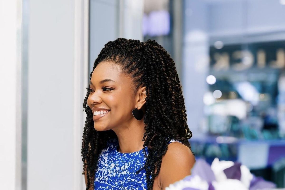 Actress Gabrielle Union wearing a blue Talensi dress.