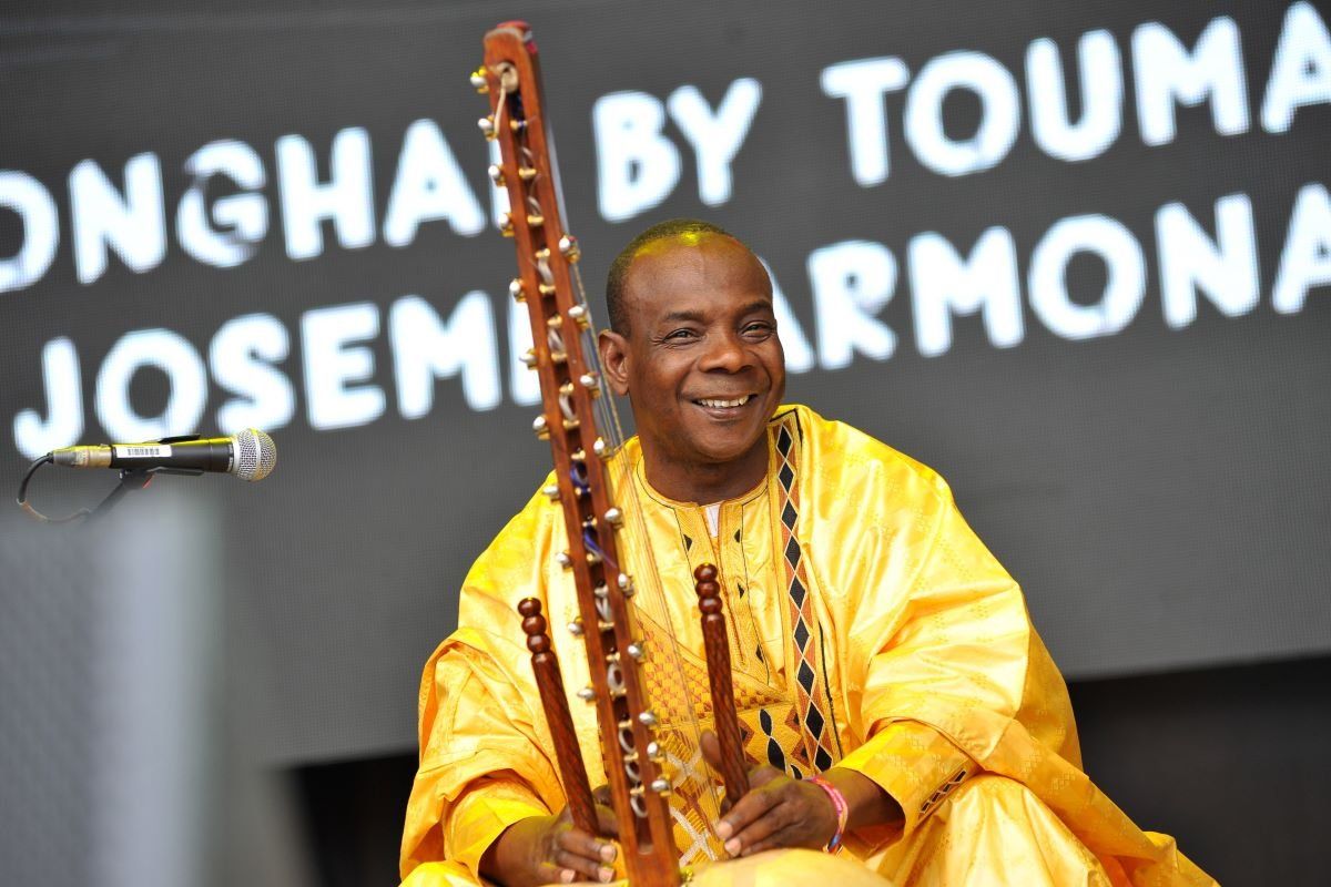Toumani Diabate performs Songhai on the Open Air Stage during Day 3 of the Womad Festival stage at Charlton Park on July 30, 2016 in Wiltshire, England.