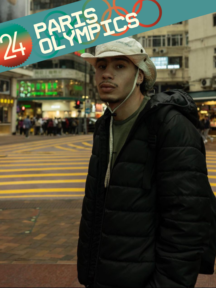 ​A portrait of Moroccan b-boy Bilal Mallkah at the center of an urban square.