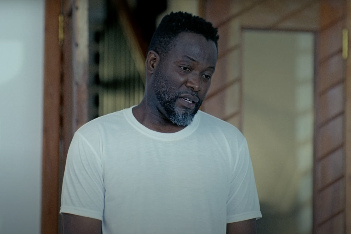 A still from ‘The Groomsmen’ showing Adjetey Anang in the frame.